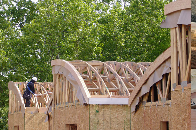 Curved roof trusses