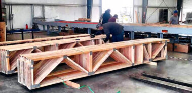 Precision Truss employees in manufacturing facility